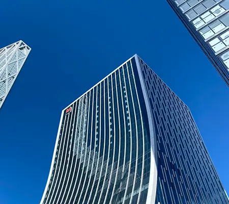 Modern glass skyscrapers viewed from below representing the banking and finance industry